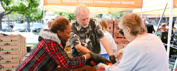 Feeding San Diego volunteers packing groceries